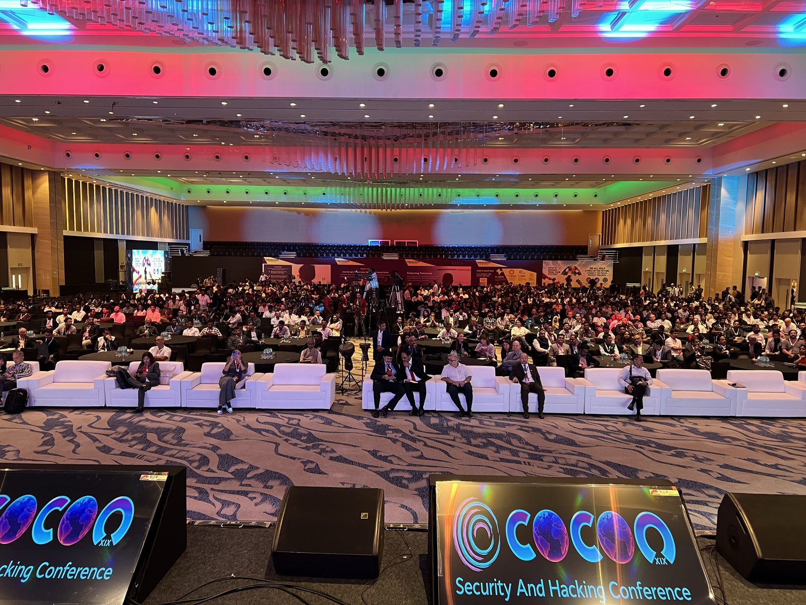 Alisa Esage delivering the opening keynote at c0c0n 2026, Kochi, India